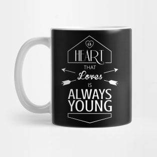 heart that loves is always young Mug